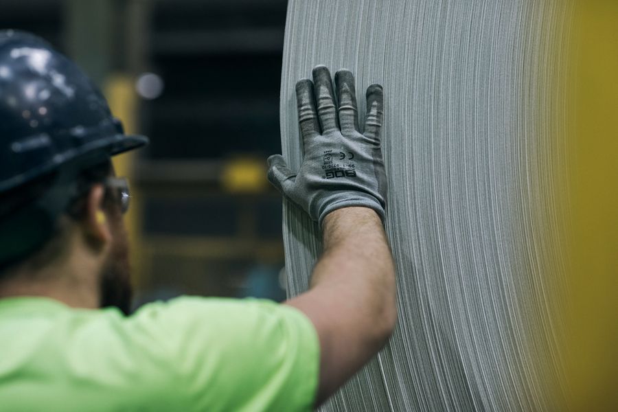 Coiled aluminium sheet material